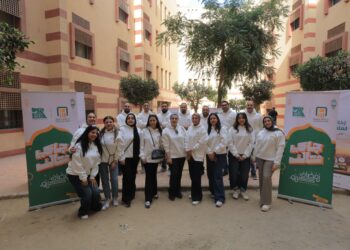البنك الأهلي المصري ينظم يومًا تطوعيًا لتعبئة كراتين رمضان بمشاركة الموظفين وأبنائهم
