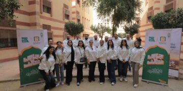 البنك الأهلي المصري ينظم يومًا تطوعيًا لتعبئة كراتين رمضان بمشاركة الموظفين وأبنائهم