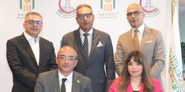 البنك الأهلي المصري يوقع بروتوكولًا مع جامعة عين شمس لدعم القطاع الصحي